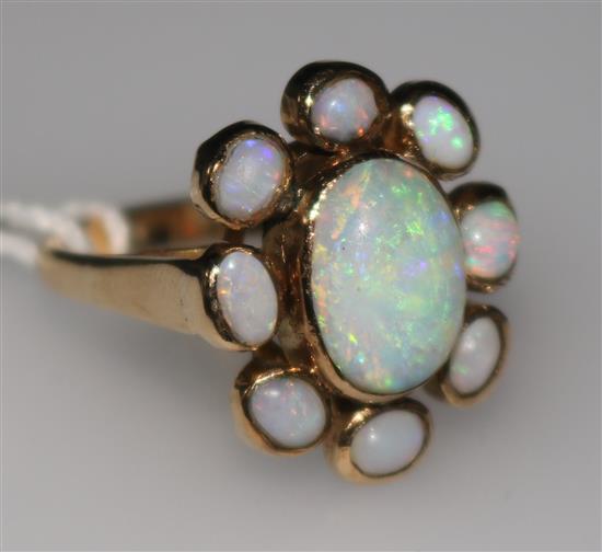 A 9ct gold & white opal cluster ring, size M.